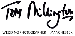 Photography by Tom Millington Logo